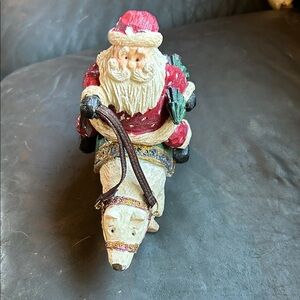 Santa Claus Riding Polar Bear Holiday Figurine